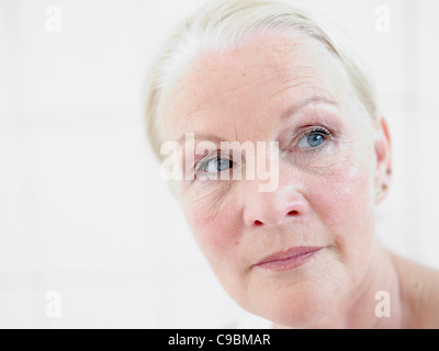 Senior woman looking away Stock Photo