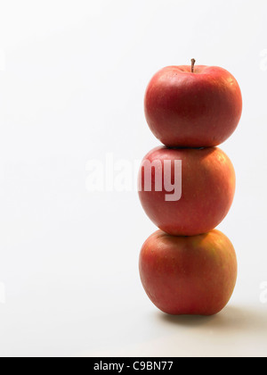 Stacked apples on white background Stock Photo