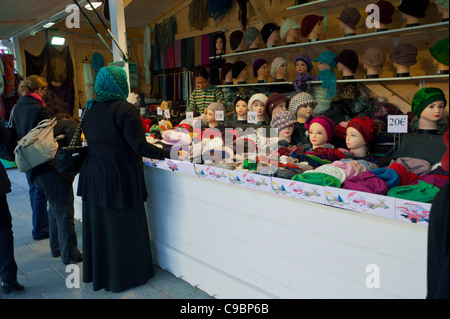 Paris, France, Arab Women Shopping in Champs Elysees Christmas Market, arabic women in hijab, fast fashion, CHRISTMAS IN PARIS, woman in hajib, muslim france, woman wearing a hijab france Stock Photo