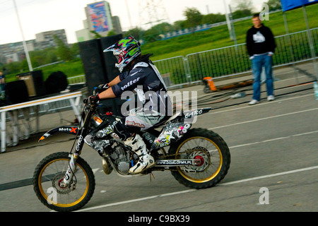 Stunt style - motorcycles trick Stock Photo