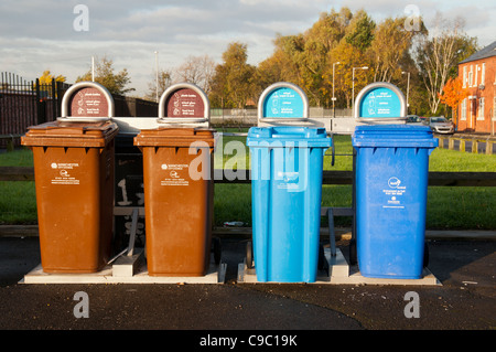 Public recycling bins on a street in Openshaw, Manchester, England, UK Stock Photo