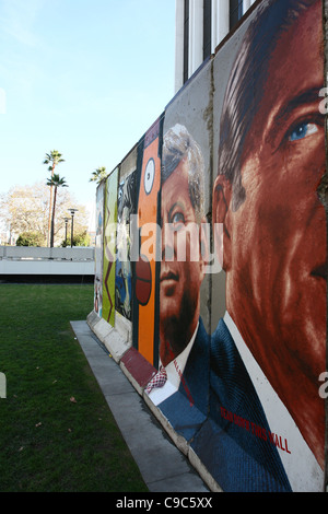 JFK & RONALD REAGAN PORTAITS & GRAFFITI BEHIND THE BERLIN WALL. PRESENTED BY THE WENDE MUSEUM LOS ANGELES CALIFORNIA USA 13 No Stock Photo