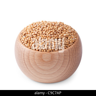 Wooden bowl full of mustard seeds isolated on white background Stock Photo