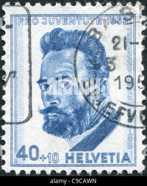 SWITZERLAND 1953: A stamp printed in Switzerland, is dedicated to the 100th anniversary of the birth of Ferdinand Hodler Stock Photo