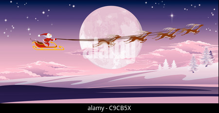 Santa's sled flying through the air in front of the moon. Stock Photo