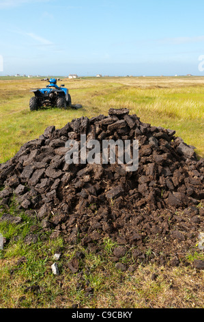 Peat cutting on the Hebridean island of South Uist. Stock Photo