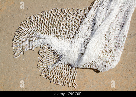 fishing new white net texture closeup in Mediterranean port Stock Photo