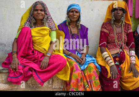India, South Asia, Karnataka, Lambani Gypsy women. Tribal forest dwellers, now settled in 30-home rural hamlets. Stock Photo