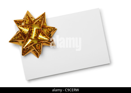 Blank card with golden bow,isolated on white. Stock Photo