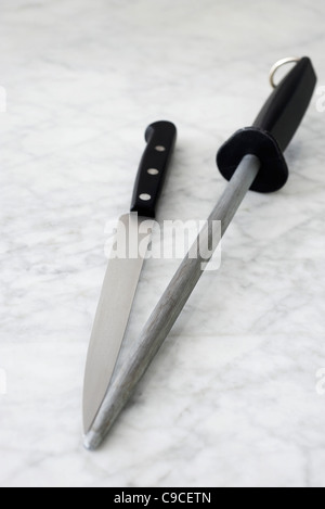 Carving knife and knife sharpener Stock Photo