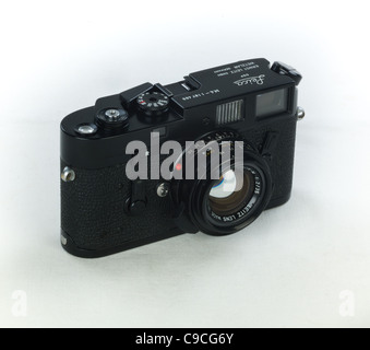 Leica M4 Black Classic  Rangefinder Camera with 35mm Summicron 'Bokeh King' Lens on White Background Stock Photo