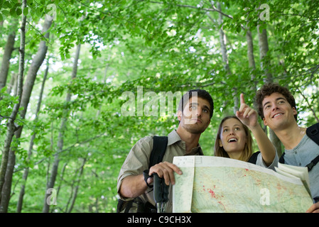 Hikers consulting map Stock Photo