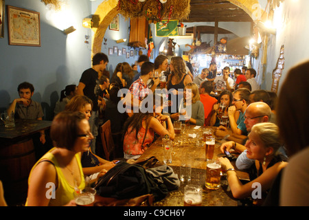 Young people at Oghorn's Bar in coso Vittorio Emanuele st., Cagliari, Sardinia, Italy. Stock Photo