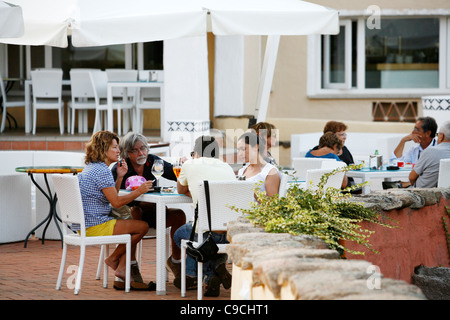 People sitting at a restaurant in Porto Cervo, Costa Smeralda, Sardinia, Italy. Stock Photo