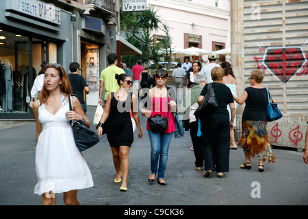 People walking at Via Giuseppe Manno, a pedestrian street with many shops, Cagliari, Sardinia, Italy. Stock Photo