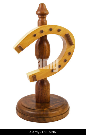 Ornamental wooden Horseshoe good luck charm on a post Stock Photo