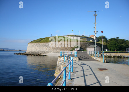 View from the Stone Pier looking towards the Nothe Fort, Weymouth on a sunny morning. Stock Photo