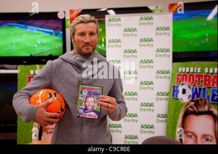 Robbie Savage arrived at Asda Spondon in Derby, UK on Tuesday 22nd December for the signing of his DVD Football Howlers”. Hundreds of fans arrived to see Robbie who was a former Derby County football player. Some of which had been queuing since 10am. He is currently dancing alongside Ola Jordan in  Stock Photo