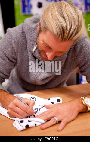 Robbie Savage arrived at Asda Spondon in Derby, UK on Tuesday 22nd December for the signing of his DVD Football Howlers”. Hundreds of fans arrived to see Robbie who was a former Derby County football player. Some of which had been queuing since 10am. He is currently dancing alongside Ola Jordan in  Stock Photo