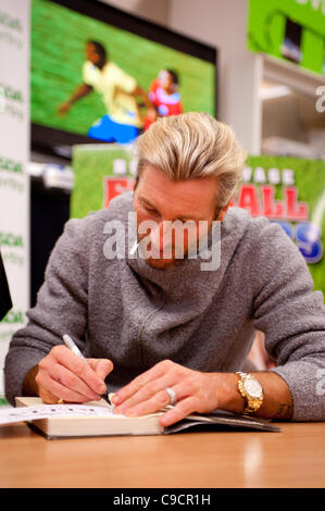 Robbie Savage arrived at Asda Spondon in Derby, UK on Tuesday 22nd December for the signing of his DVD Football Howlers”. Hundreds of fans arrived to see Robbie who was a former Derby County football player. Some of which had been queuing since 10am. He is currently dancing alongside Ola Jordan in  Stock Photo