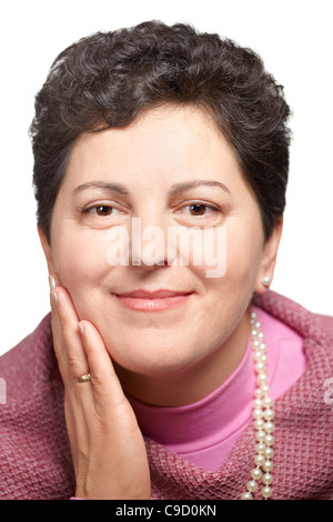 Portrait of a beautiful middle aged woman against a white background. Stock Photo