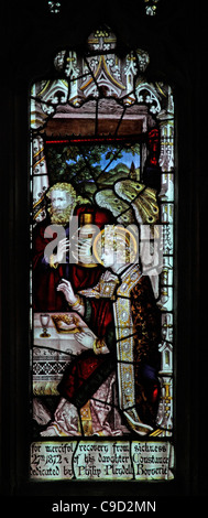 Stained glass window by the Kempe Studios depicting The Hospitality of Abraham Stock Photo