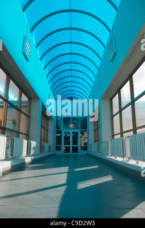 Long high hall with a cyan roof of cellular polycarbonate Stock Photo