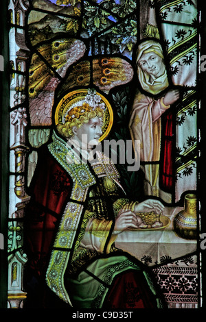 Stained glass window by the Kempe Studios depicting The Hospitality of Abraham, St Mary the Virgin Church, Cannington, Somerset Stock Photo