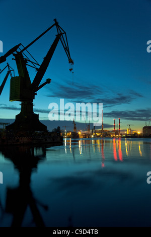 Industrial view at night in shipyard of Gdansk, Poland. Stock Photo