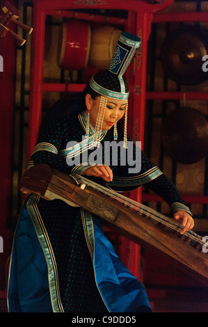 Musician of Tumen Ekh ensemble performs traditional mongolian music in Ulan Bator. Stock Photo