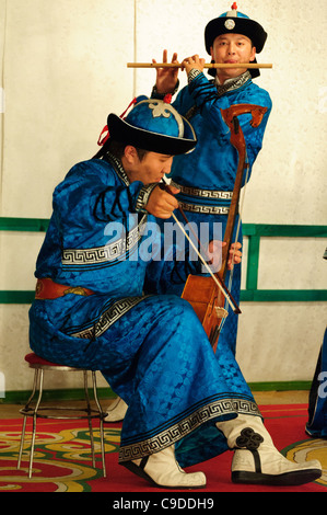 Musician of Tumen Ekh ensemble performs traditional mongolian music in Ulan Bator. Stock Photo