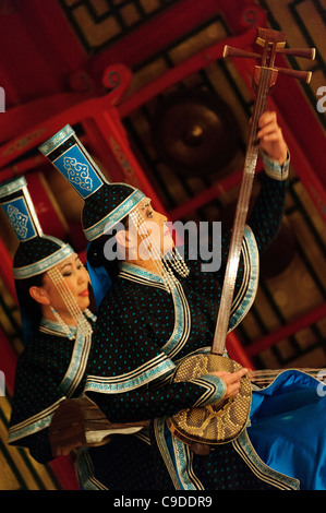 Musician of Tumen Ekh ensemble performs traditional mongolian music in Ulan Bator. Stock Photo