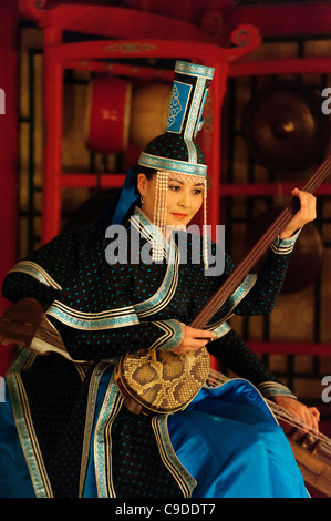 Musician of Tumen Ekh ensemble performs traditional mongolian music in Ulan Bator. Stock Photo