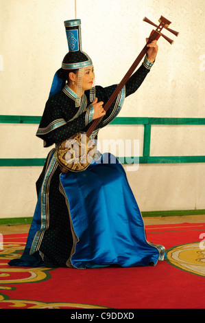 Musician of Tumen Ekh ensemble performs traditional mongolian music in Ulan Bator. Stock Photo