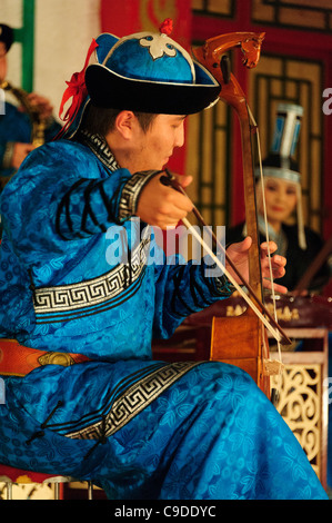 Musician of Tumen Ekh ensemble performs traditional mongolian music in Ulan Bator. Stock Photo