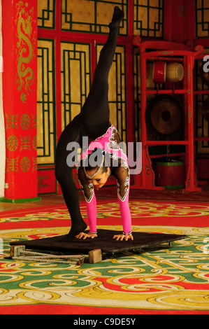 Contortionist dancer of Tumen Ekh mongolian ensemble performs in Ulan Bator. Stock Photo