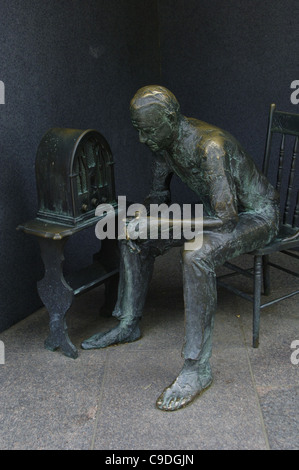 Franklin Delano Roosevelt Memorial. Bronze statue.It depicts the Great Depression. Man listening to a fireside chat on the radio Stock Photo