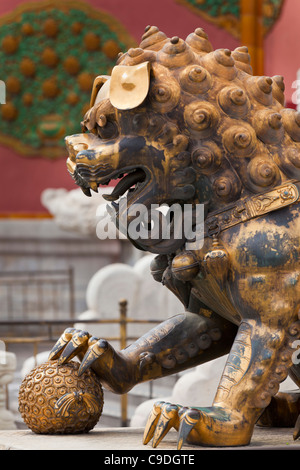 Male bronze lion, inside the Forbidden City, Beijing, Peoples Republic of China, Asia Stock Photo