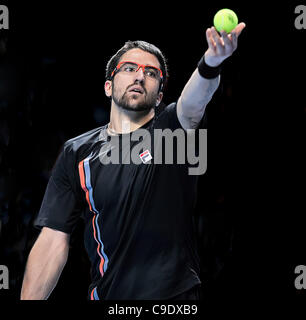 25.11.2011 London, England Novak Djokovic of Serbia during his singles round robin match  against Janko Tipsarevic of Serbia at the Tennis Barclays ATP World Tour Finals 2011 at 02 London Arena. Stock Photo