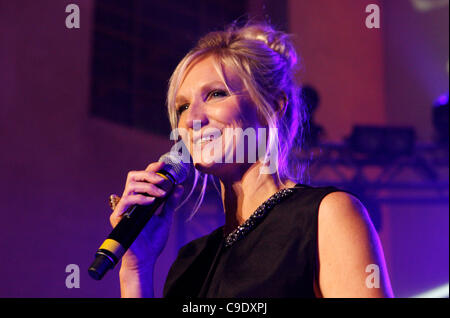 LONDON, UK, 25/11/2011. Jo Whiley curator of Mencap’s Little Noise Sessions introduces acts at a church in Hackney, London. The event is the fourth of six consecutive concerts by various artists in aid of Mencap, a charity working with people with learning disability, their families and carers. Stock Photo