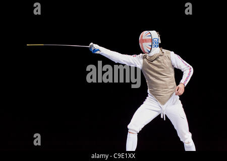 James Kenber (GB) in the final of the team foil fencing at the Olympic test event, London's ExCeL arena. Won by Team GB. Stock Photo