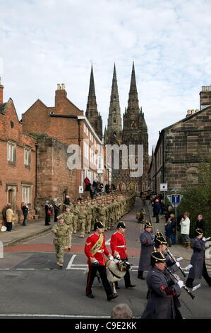 Soldiers from the 3rd Battalion of the Mercian Regiment marching from Lichfield Cathedral on their way around the city of Lichfield, Staffordshire, England prior to a Homecoming Service in Lichfield Cathedral on 28th November 2011 following their return from Afghanistan Stock Photo