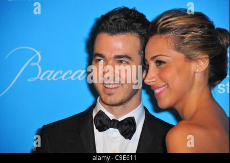 Kevin Jonas, Danielle Jonas at arrivals for The 8th Annual UNICEF Snowflake Ball, Cipriani Restaurant 42nd Street, New York, NY November 29, 2011. Photo By: Gregorio T. Binuya/Everett Collection Stock Photo