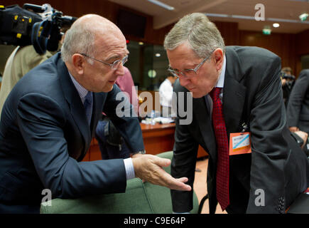 Pictured at the Ecofin meeting of European Finance Ministers Joaquín Almunia, Vice-President of the European Commission and Commissioner responsible for competition. Klaus Regling, Chief Executive, European Financial Stability Facility. Stock Photo
