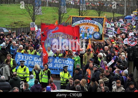 Glasgow, UK. 30th Nov, 2011. Protestors gather in Shuttle Street, Glasgow, to march to the Gallowgate to protest against Government pension plans for public workers. Stock Photo
