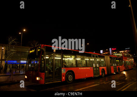 Final days of the bendy Bus: A route 207 bendy bus is seen on 8th December 2011 at Shepherd's bush bus station. Transport for London (TfL) confirmed that Friday 9th December will be the final day of the bendy bus being seen in service on the streets of London as they are removed and replaced by doub Stock Photo