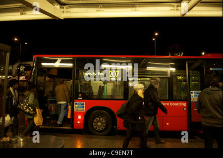 Final days of the bendy Bus: A route 207 bendy bus is seen on 8th December 2011 at Shepherd's bush bus station. Transport for London (TfL) confirmed that Friday 9th December will be the final day of the bendy bus being seen in service on the streets of London as they are removed and replaced by doub Stock Photo