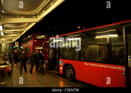 Final days of the bendy Bus: A route 207 bendy bus is seen on 8th December 2011 at Shepherd's bush bus station. Transport for London (TfL) confirmed that Friday 9th December will be the final day of the bendy bus being seen in service on the streets of London as they are removed and replaced by doub Stock Photo