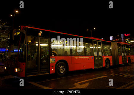 Final days of the bendy Bus: A route 207 bendy bus is seen on 8th December 2011 at Shepherd's bush bus station. Transport for London (TfL) confirmed that Friday 9th December will be the final day of the bendy bus being seen in service on the streets of London as they are removed and replaced by doub Stock Photo