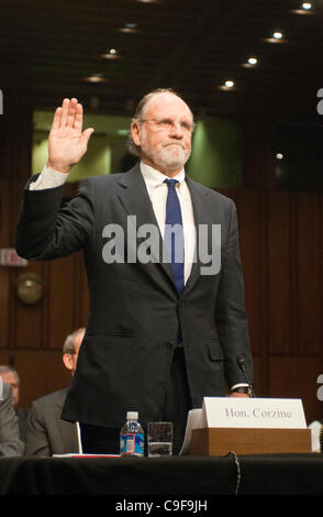 Former Gov. John Corzine is sworn in at a Senate Agriculture, Nutrition and Forestry Committee hearing on the circumstances surrounding the bankruptcy of MF Global Holdings Ltd. on Capitol Hill. Stock Photo